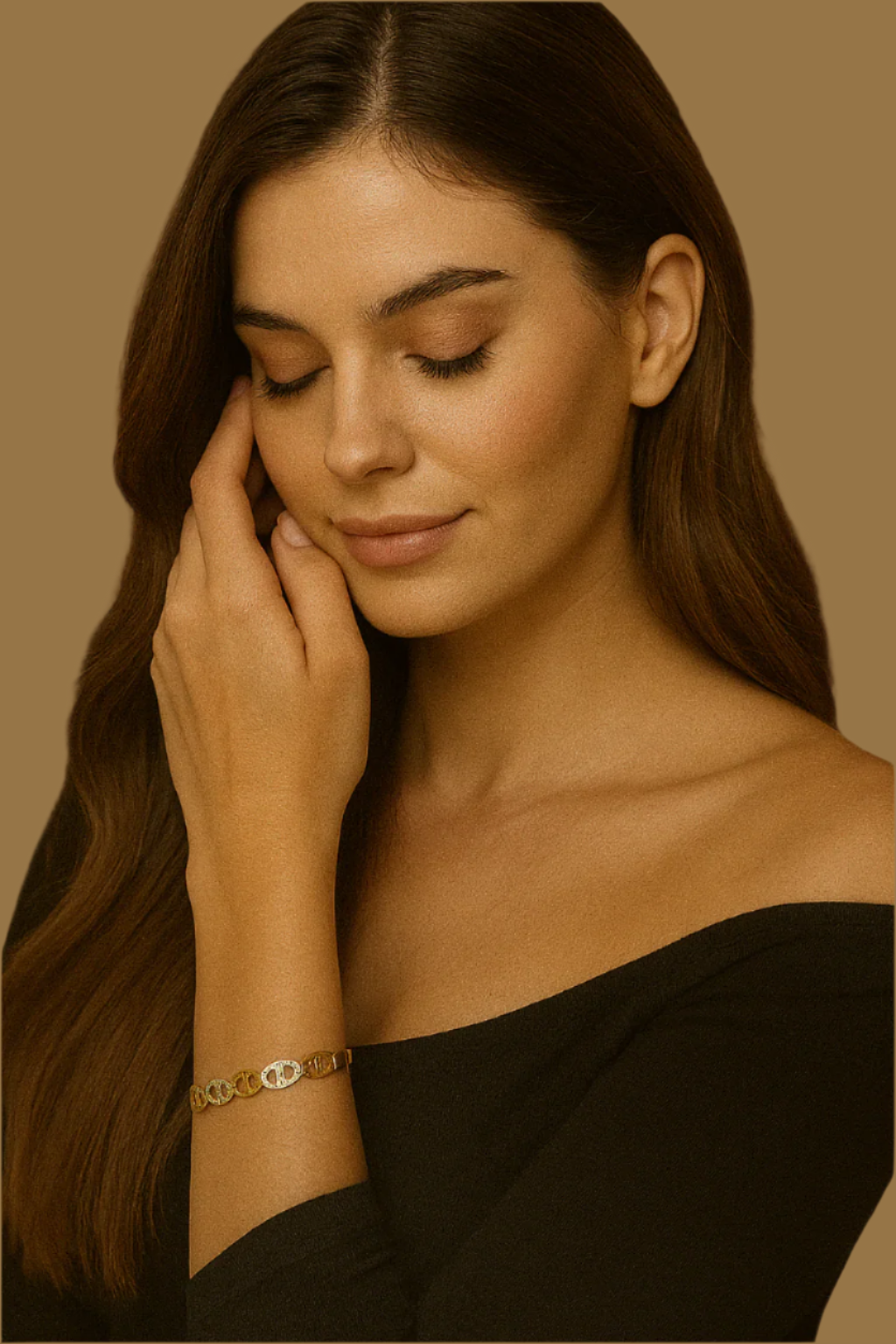 Woman wearing a gold bracelet against a warm brown background