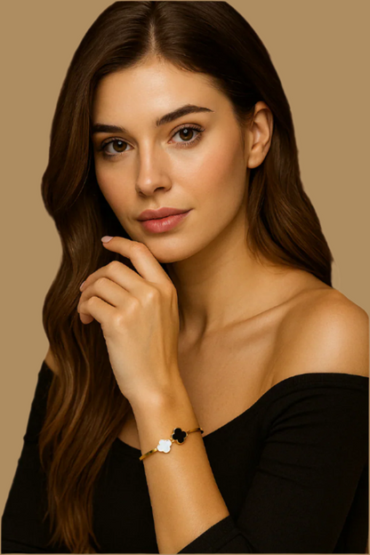 Woman wearing a bracelet with a brown background